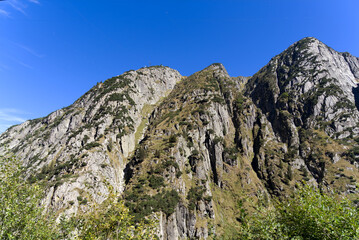 Scenic view of famous Schöllenen Gorge, Canton Uri, on a sunny late summer afternoon. Photo taken September 12th, 2022, Schöllenen Gorge, Switzerland.
