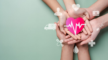 Adult and children hands holding red heart donation with pulse cardiogram, health care, organ donation, family life insurance, world heart day, world health day, praying concept - obrazy, fototapety, plakaty