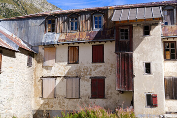 Abandoned building at hamlet Gletsch, Canton Valais, in the Swiss Alps on a sunny late summer noon. Photo taken September 12th, 2022, Gletsch, Switzerland.