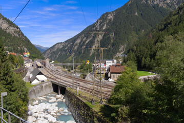 Railway station of mountain village Göschenen, Canton Uri, on a sunny late summer afternoon. Photo taken September 12th, 2022, Göschenen, Switzerland.