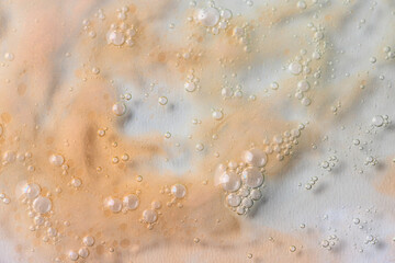 Abstract Two tone abstract water gel texture with bubbles. White beige tone
