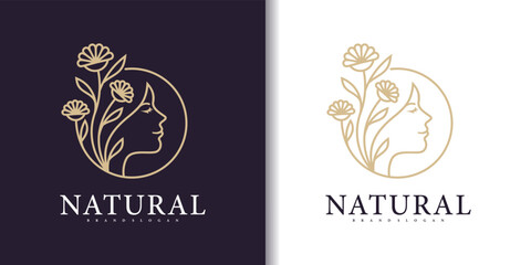 Beauty feminine salon logo with combined floral and woman face Premium Vektor