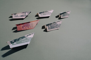 Fighters from banknotes of dollars and euro