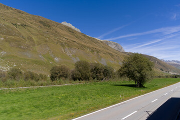 Scenic landscape at Swiss mountain valley Urserntal, Canton Uri, in the Swiss Alps on a sunny late summer day. Photo taken September 12th, 2022, Ursern Valley, Switzerland.