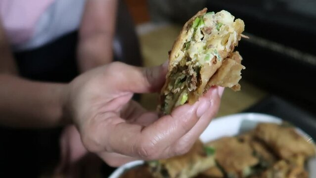 Indonesian cake dessert called Martabak Terang Bulan sweet, and martabak telor savory