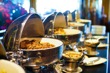 People grab buffet food and salad food in hotel restaurant seminar trainning