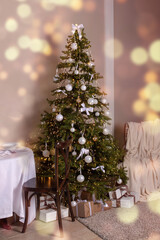Christmas tree with blur background. Interior in retro style. 