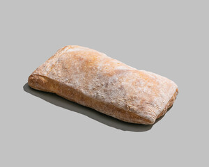 Classic ciabatta bread isolated on grey background closeup