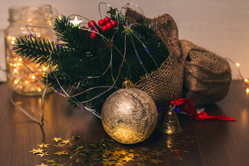 Christmas tree, Christmas lights and Christmas ornaments. Golden stars. Home decoration for the New Year. Winter holidays. Festive background