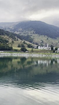 The town of Isola (Lombardy, Italy). Taken from the opposite shore of Lake Isola.
The main subject is the church.
Isola is a typical mountain village located at the foot of Monte Spluga.