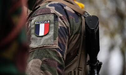 France Army soldiers uniform. Close up photo with the France flag on a military soldier uniform...