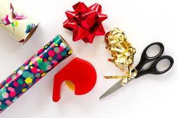 Gift-wrapping paper, scissors, sticky tape and decorations