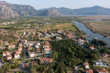 Aerial view of Dalyan river and boats with Iztuzu Beach Scenery, Turkey.