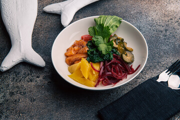 Bowl with salmon and mango