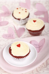 Red velvet cupcakes with hearts for Valentine's Day