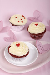 Red velvet cupcakes with hearts for Valentine's Day