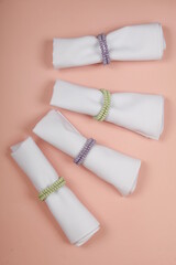 Top shot of table napkins set on pastel colored background