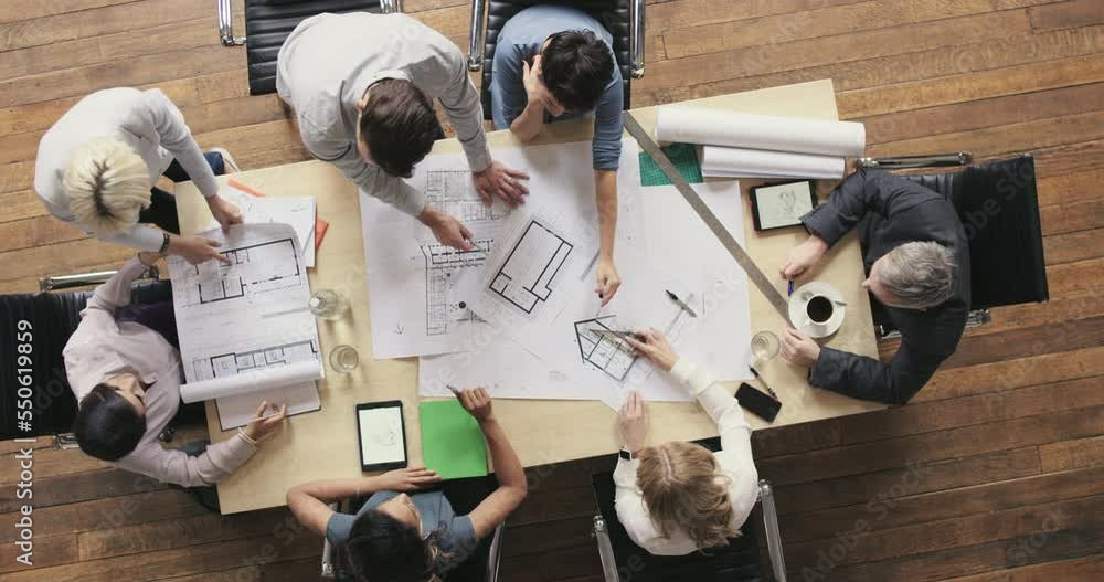 Poster Architecture, team and blueprint planning in an engineering office from above for construction building. Architect group, sketch and document in a corporate strategy meeting for design plan overhead