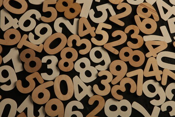 Colorful wooden numbers background. Numbers texture abstraction. Global economy crisis concept. Finance data pattern.