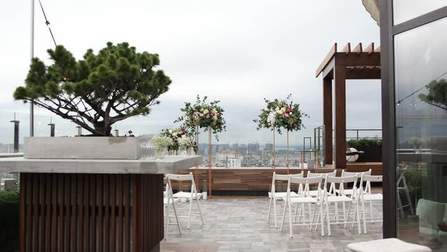 an arch for a wedding ceremony on the roof