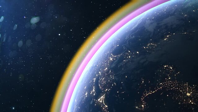 Escena del espacio donde se puede ver la atm&oacute;sfera de la tierra y los colores de &eacute;sta.