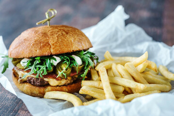creative burger on the wooden background