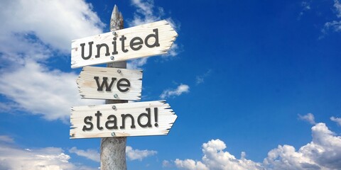 United we stand - wooden signpost with three arrows