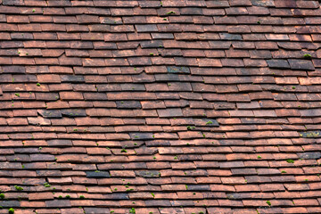 background texture of old red clay roof tiles 