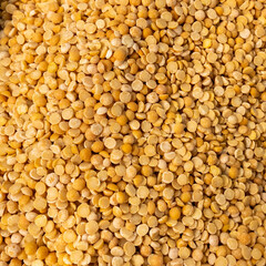 Yellow dry peas texture background. Natural healthy vegan food, diet concept