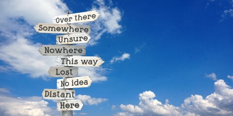 Direction concept - wooden signpost with many arrows © PX Media