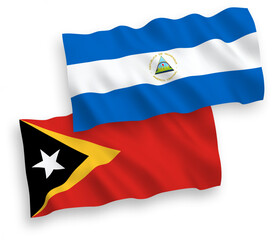 Flags of Nicaragua and East Timor on a white background