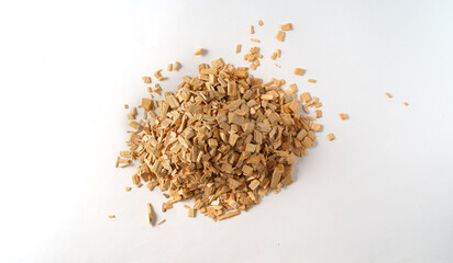 Top view a pile of wood wood texture chips isolated on white background.