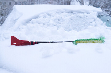 pictured car littered with large snowdrifts