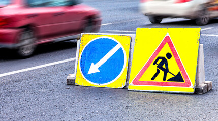 Keep left road sign at the city street