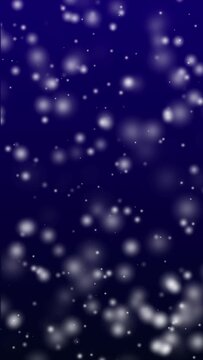 Snow falling in dark blue background