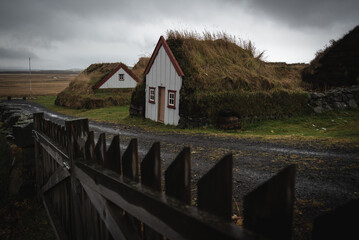 Fototapeta na wymiar Wooden house with grass on the roof in Iceland