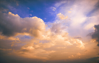 Naklejka na ściany i meble dramatic landscape with sun rays and clouds