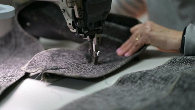 Woman sewing with a machine