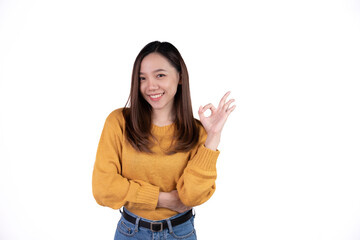 Obraz na płótnie Canvas Young asian woman, professional entrepreneur standing in office, smiling and looking confident, white background
