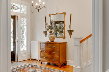 Entryway interior historic foyer traditional decor window white railing rowhome