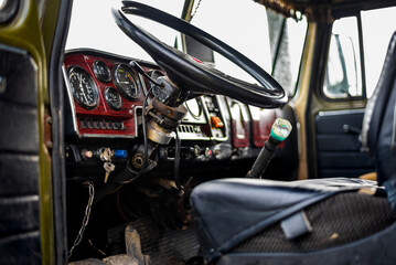 The control panel in the cab of an old truck