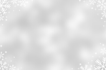 abstract blur beautiful glowing white color gradient background with shining falling snowflakes crystal glittering effect for christmas festival and happy new year season design as banner concept