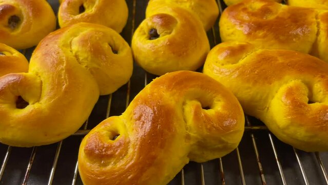 Close up of homemade Swedish saffron buns, a traditional sweet bread baked for the Christmas holiday. Footage made in Sweden.