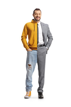 Young man wearing suit and tie on one half and jeans and hoodie on other half