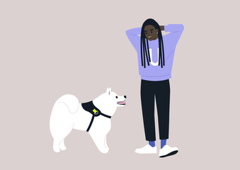 A young female African pet owner and their samoyed dog looking at each other, friendship with animals