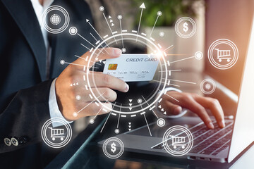 Close-up, male hand using smartphone and credit card for online transactions to pay for financial goods and services. Installment payment for convenience, lifestyle in living And there are also risks.