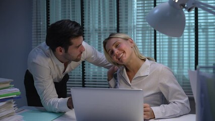 Young Caucasian woman was harassed by a male supervisor at work while she was working overtime at night.