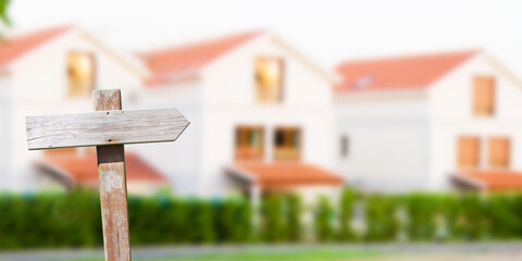 vintage sign with buildings in the background