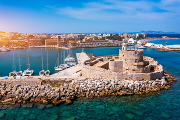 Mandraki port with deers statue, where The Colossus was standing and fort of St. Nicholas. Rhodes,...