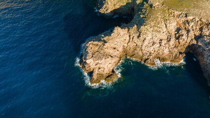 aerial views with 4k drone, centinal direction of rocks and sea.